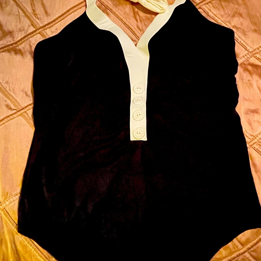 Lovely black swim suite. Just in time for swim weather! ( make offer)